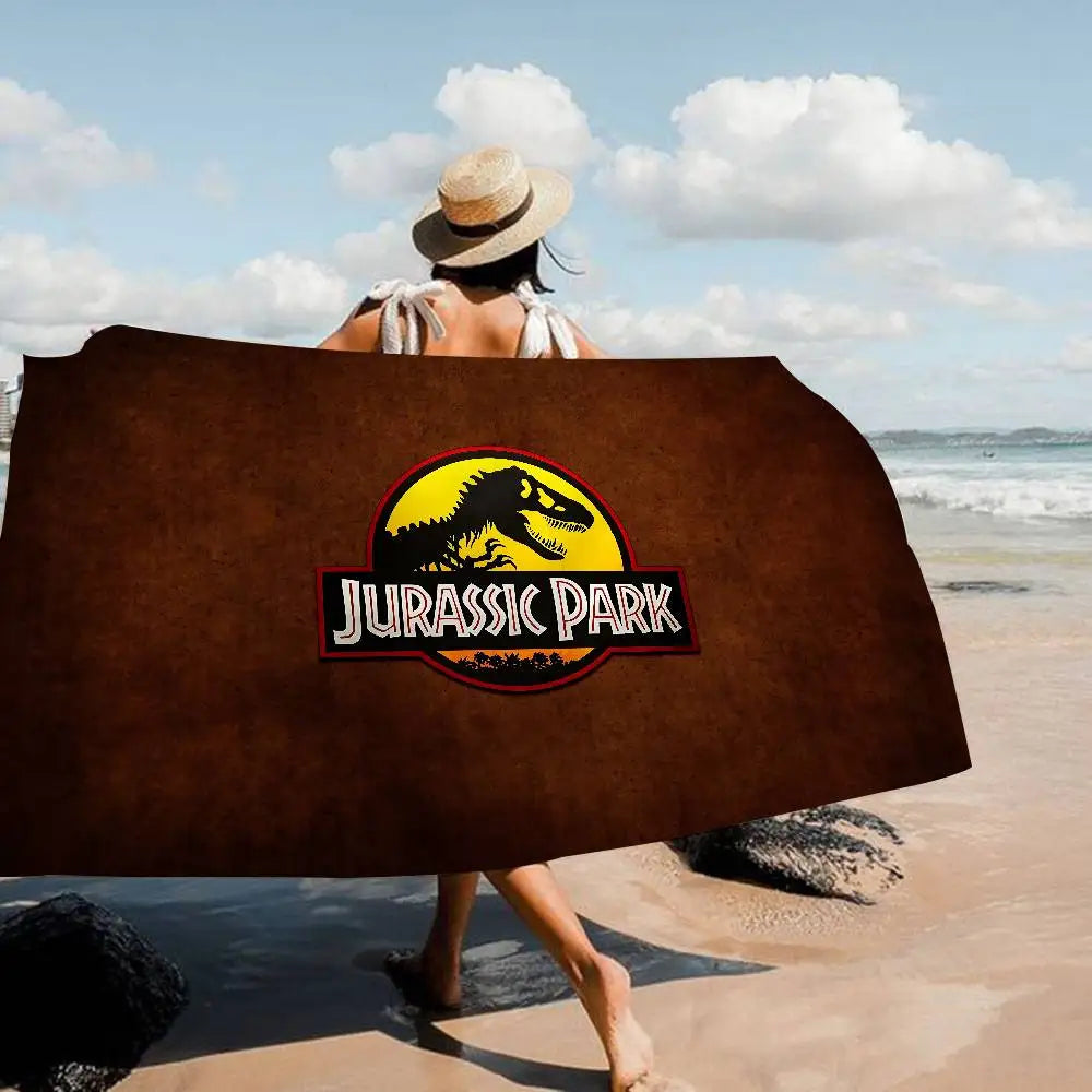 Asciugamano Jurassic Park su Fondo Colorato – Telo Mare e Bagno in Poliestere e Cotone, 4 Modelli 7 Misure