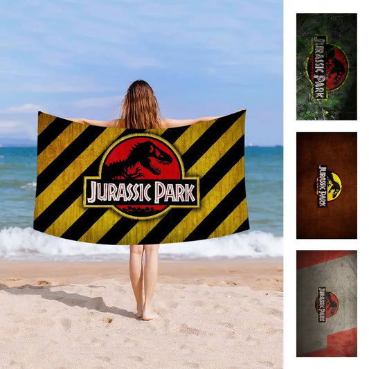 Asciugamano Jurassic Park su Fondo Colorato – Telo Mare e Bagno in Poliestere e Cotone, 4 Modelli 7 Misure