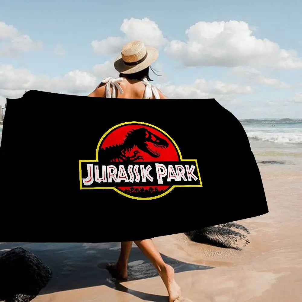 Asciugamano Jurassic Park su Fondo Colorato – Telo Mare e Bagno in Poliestere e Cotone, 4 Modelli 7 Misure