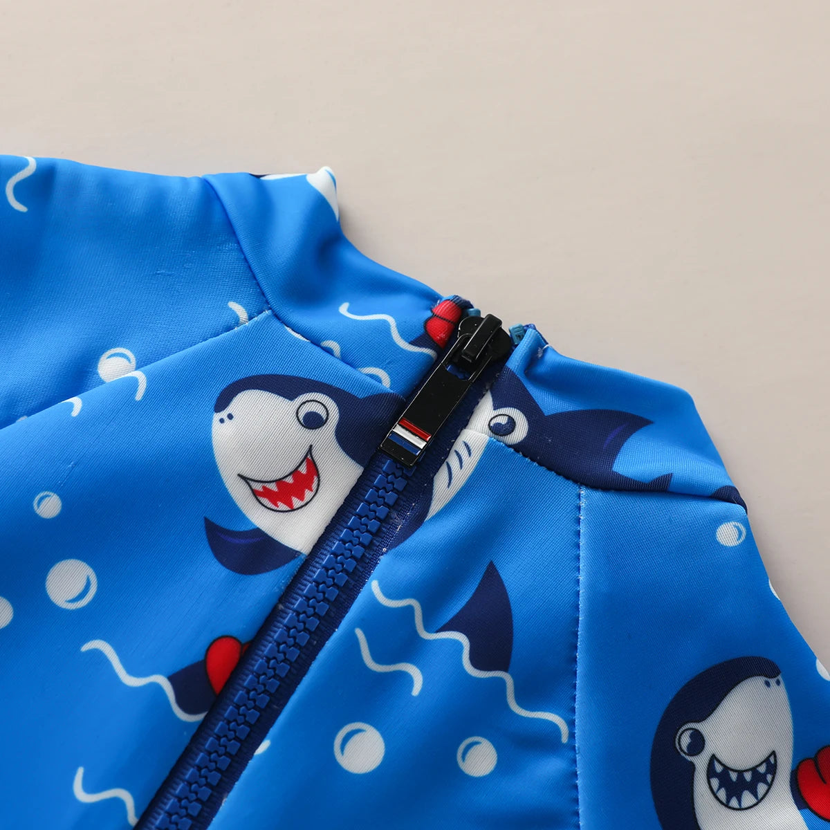Rash Guard Neonato e Bambino con Cerniera e Stampa Squaletti – Manica Corta, 0–3 Anni