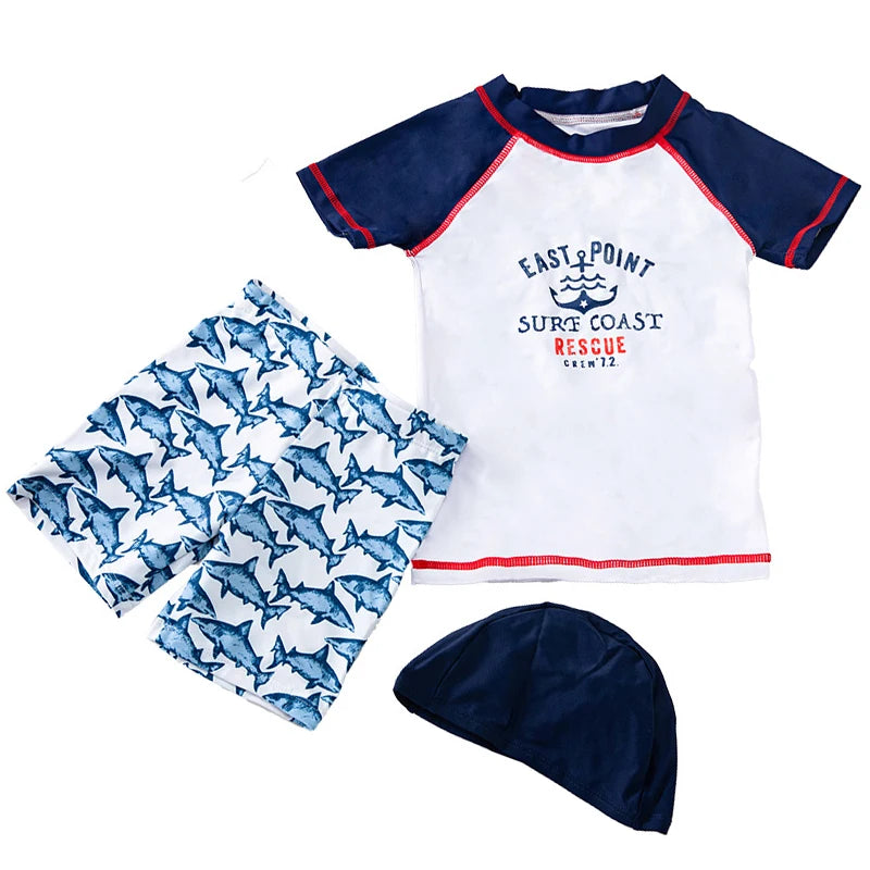 Set Nuoto Bambini 3 Pezzi UPF50+ – Rash Guard + Costume + Cuffia - Squalo Dinosauro Mare Piscina, XS(2)–3XL(14) 20 Fantasie