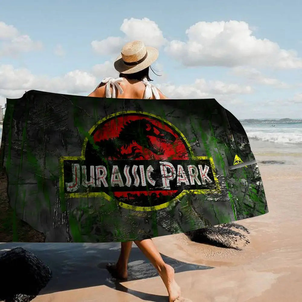 Asciugamano Jurassic Park su Fondo Colorato – Telo Mare e Bagno in Poliestere e Cotone, 4 Modelli 7 Misure